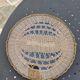 Round tray in woven wicker and glass