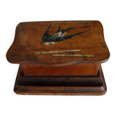 Old wooden feather box