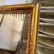Wooden mirror with gilded stucco and beaded frieze, 45 x 37 cm