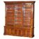Monumental high Victorian library in solid mahogany with astral display cases.