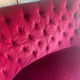 Small old Napoleon III toad sofa in red velvet