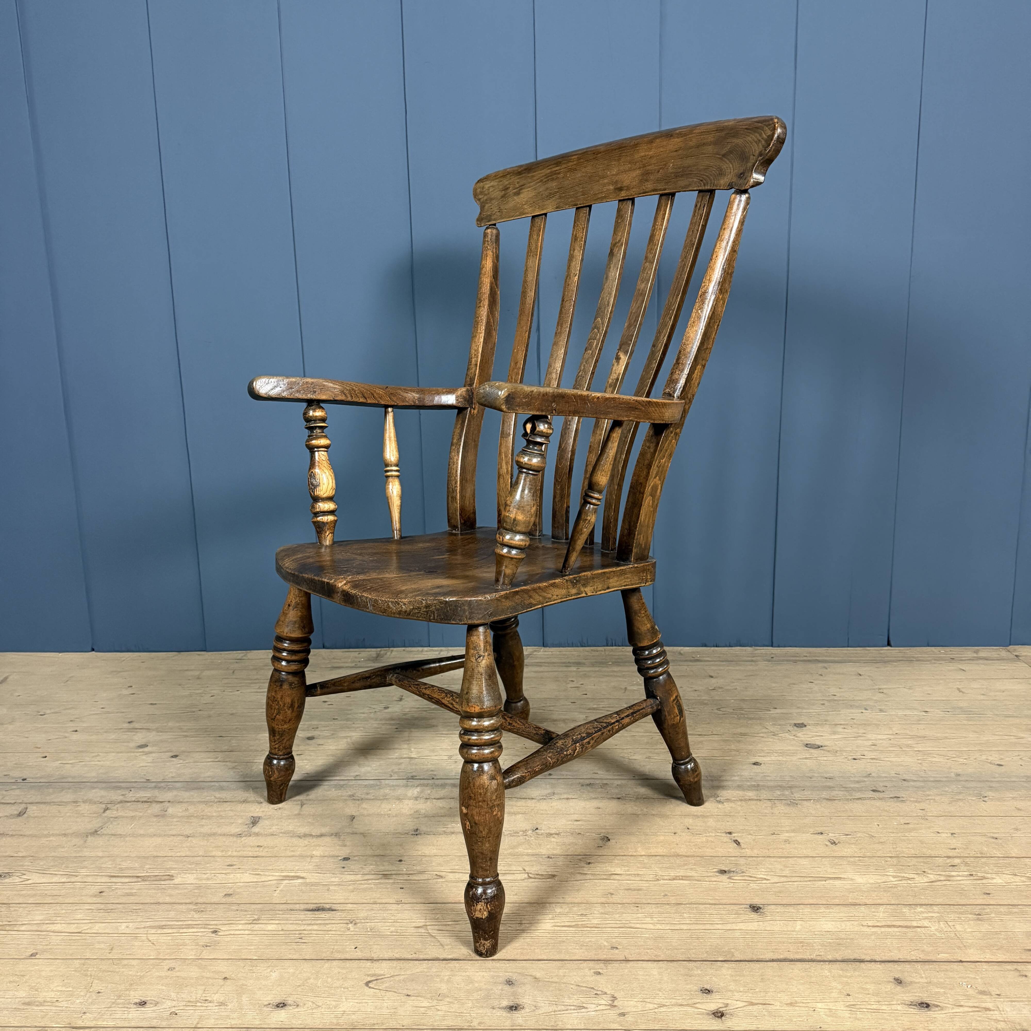 Brown English Windsor armchair with high back
