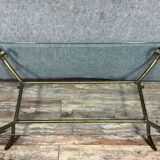 Coffee table in gilded brass and glass