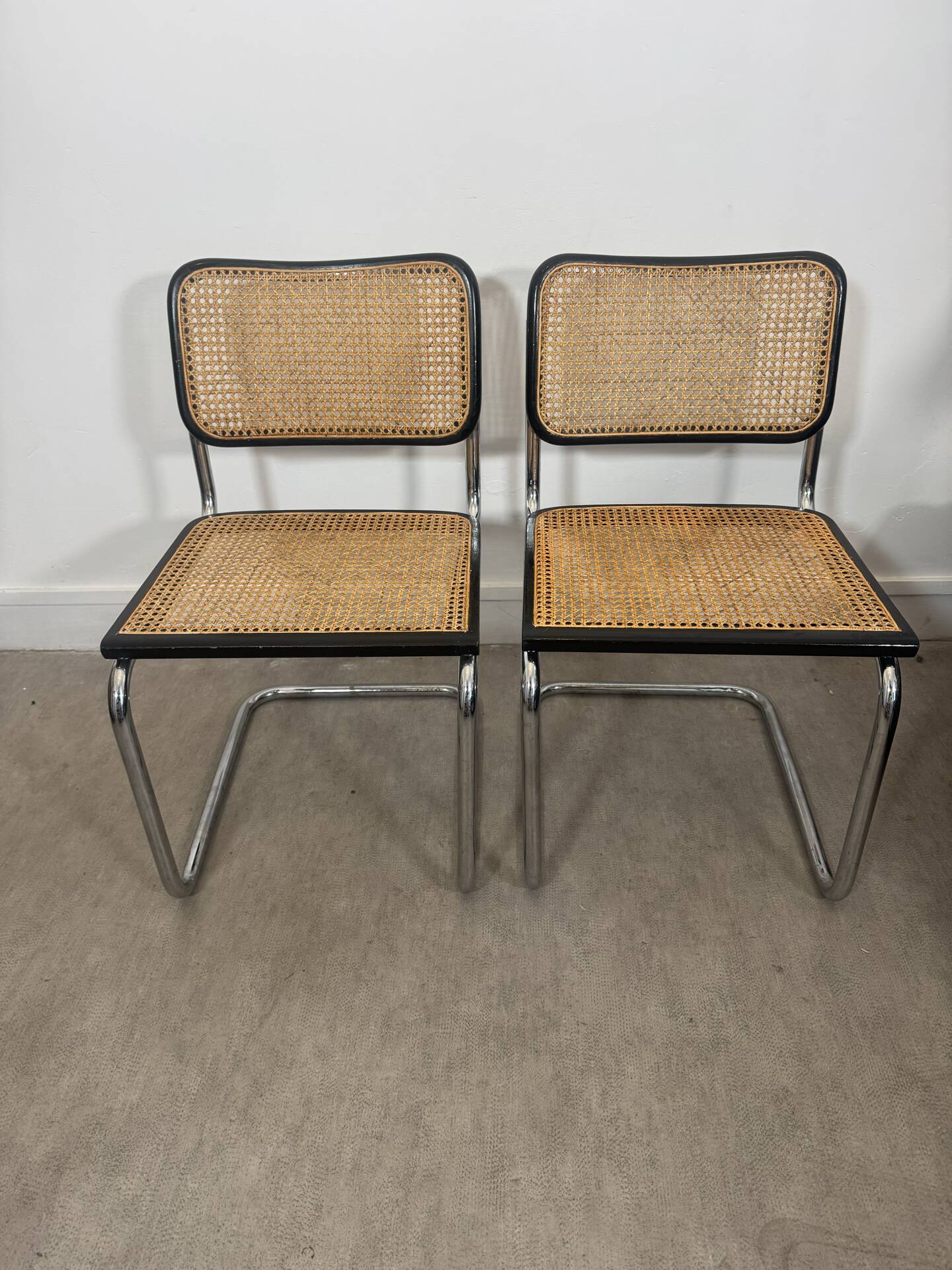 Pair of Marcel Breuer B32 Cesca chairs made in Italy.