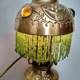 Brass lamp "La Parisienne" at the end of the 19th century.