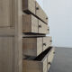 Brutalist commode with stripped diamond tips.