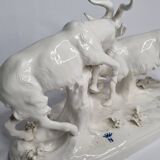 Saxon porcelain group, two fighting goats, signed Röhle, 1900