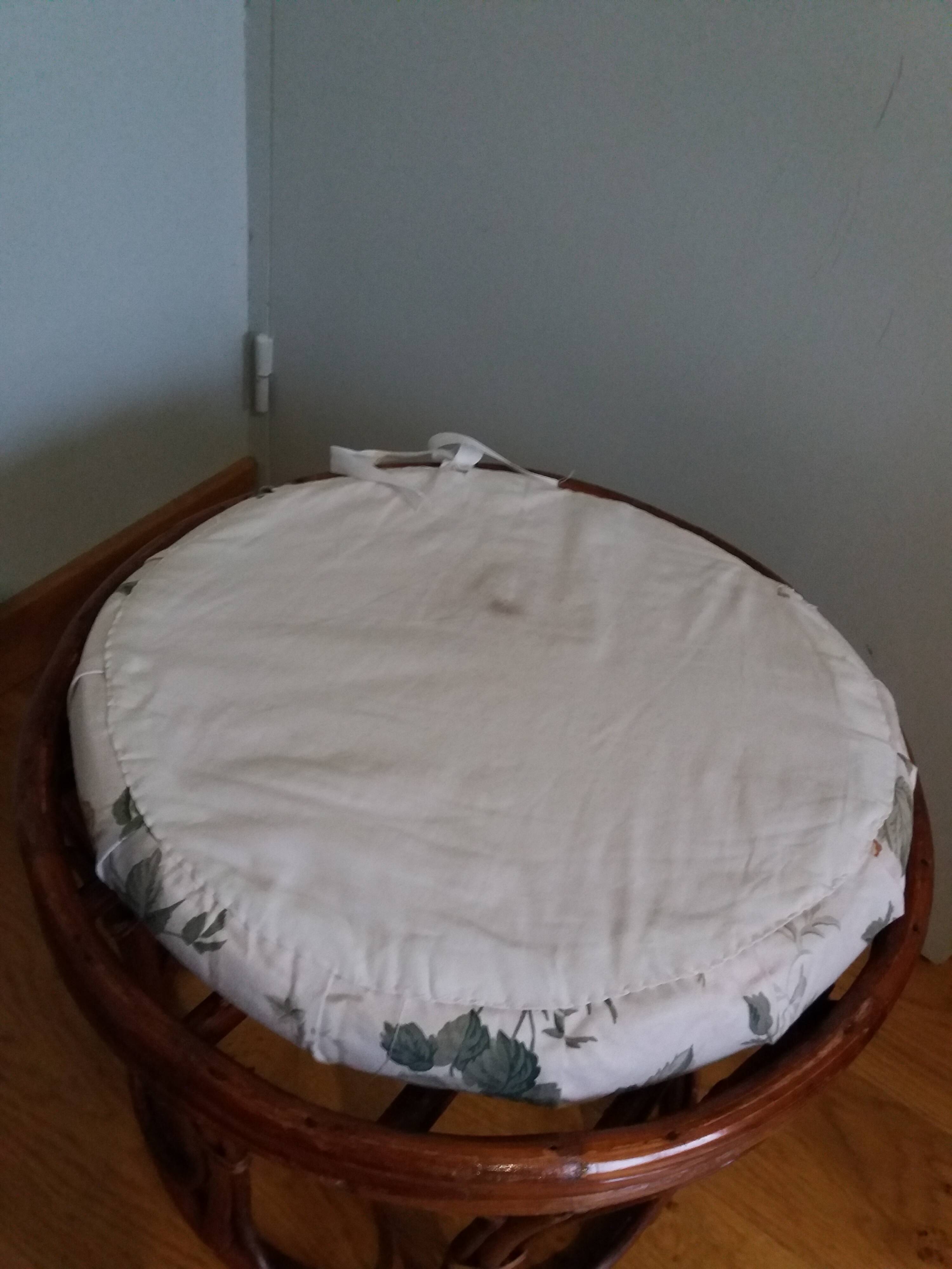 Wicker pouf with cushion