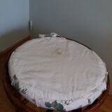 Wicker pouf with cushion