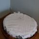 Wicker pouf with cushion