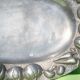 Service tray made of cast aluminium with vegetable decoration