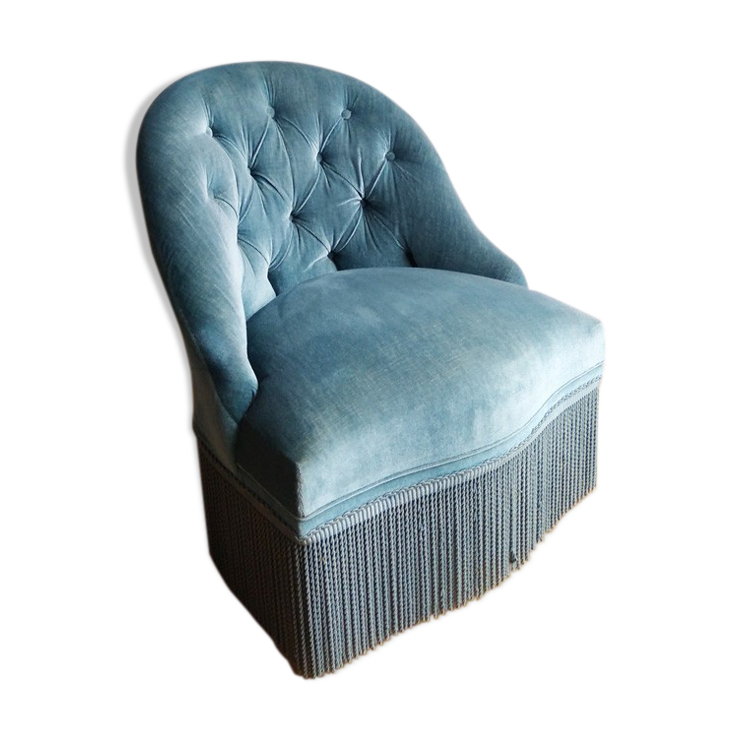 Armchair in blue velvet