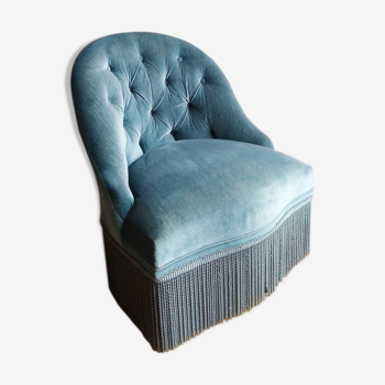 Armchair in blue velvet