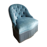 Armchair in blue velvet