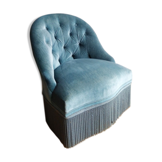 Armchair in blue velvet