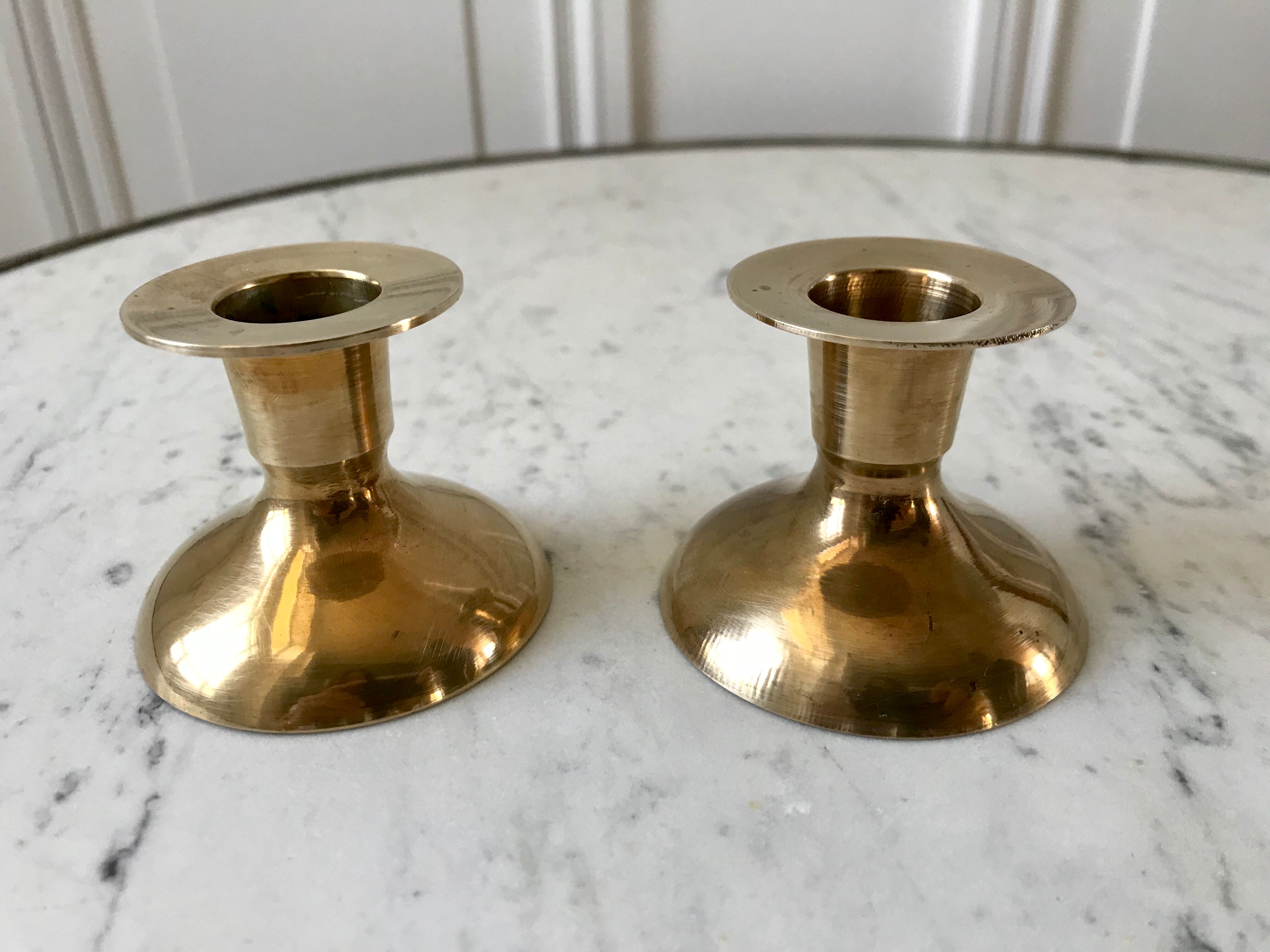 Duo of brass candle holders 20s
