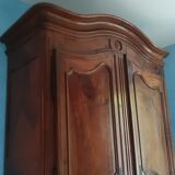 Large Louis XV style gendarme's hat-shaped wardrobe