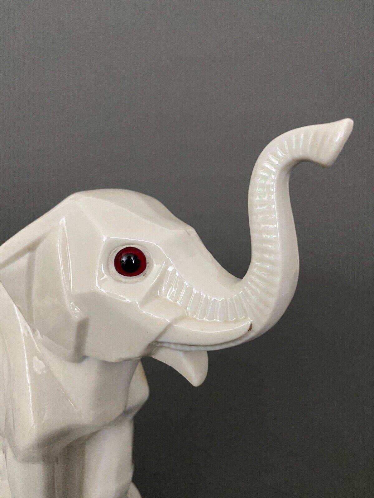 Art Deco 1930 elephant night light in white porcelain
