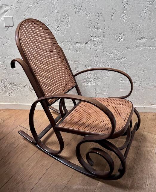 Curved wooden rocking chair