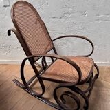 Curved wooden rocking chair