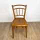 Pair of curved wood bistro chairs and studded and perforated seat