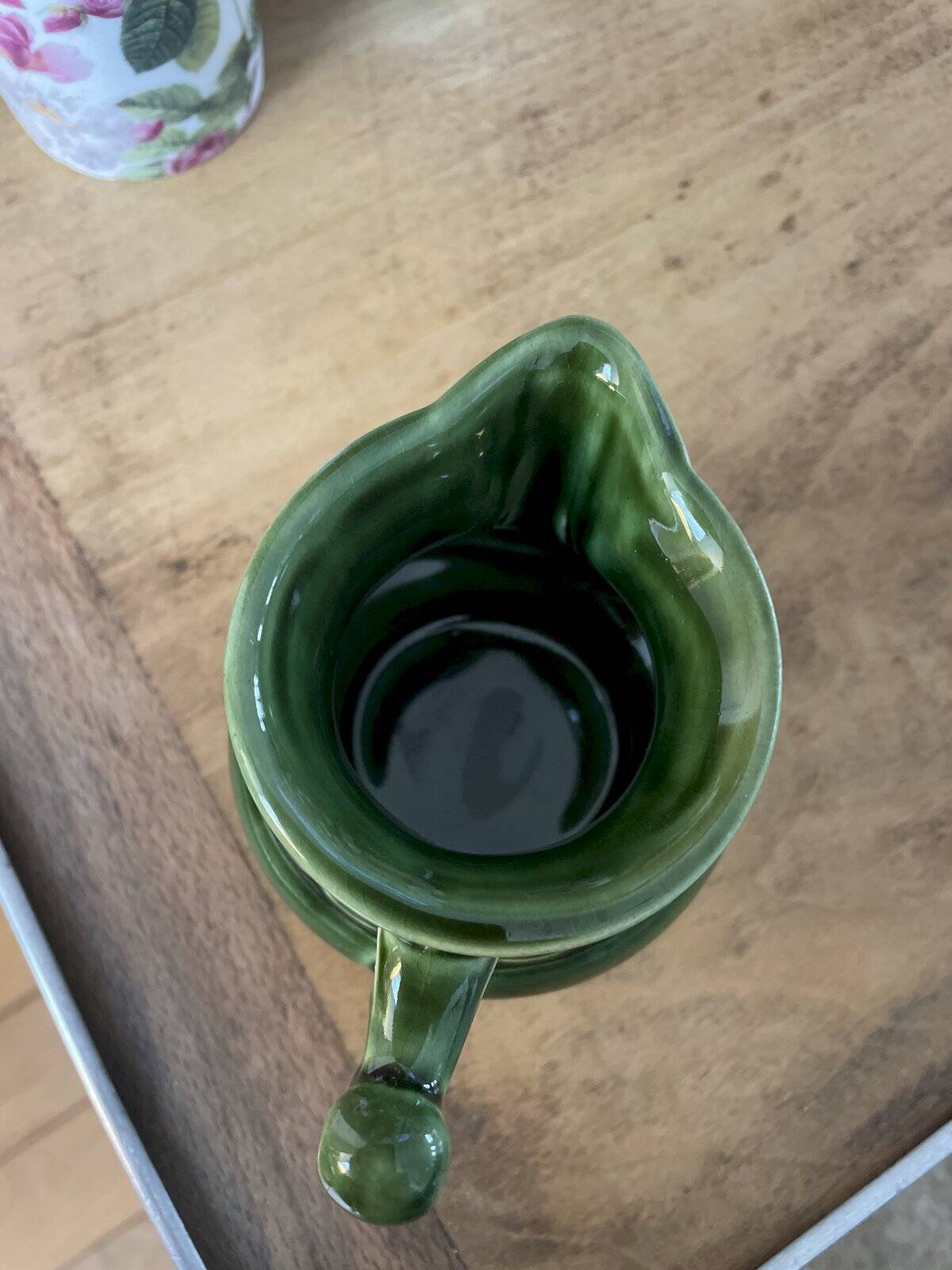 Green ceramic milk jug