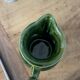 Green ceramic milk jug