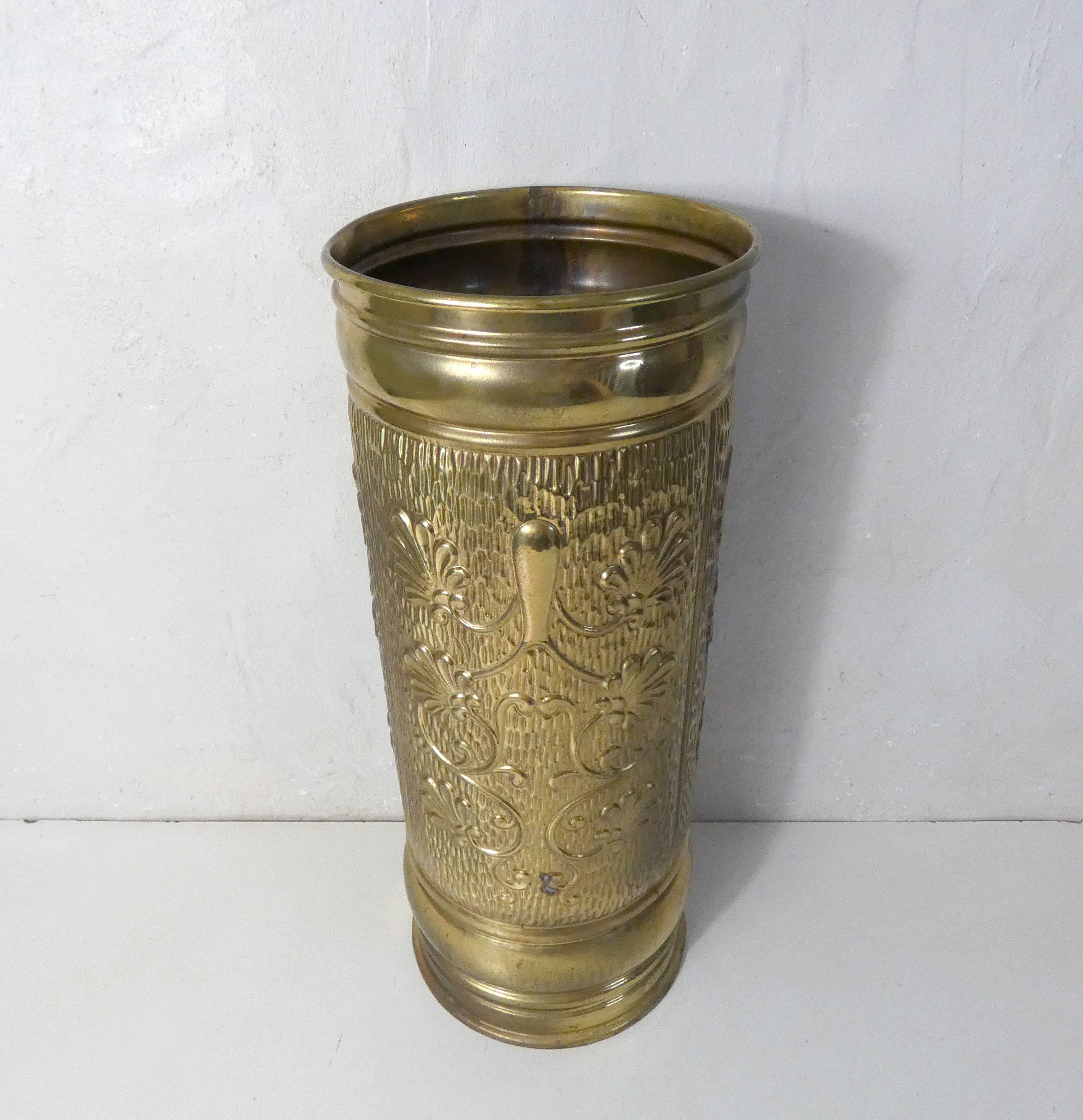 Old brass umbrella stand
