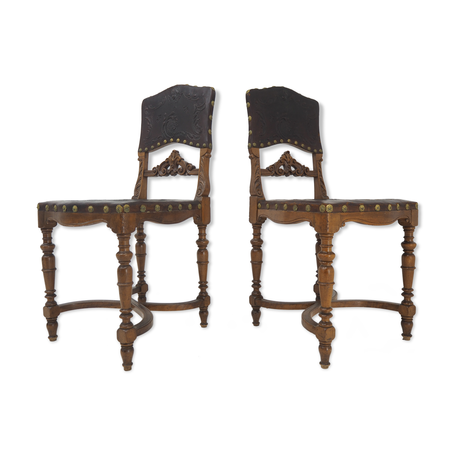 Pair of Antique Embossed Leather Chairs