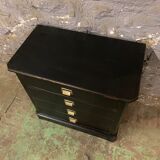 Old black patinated chest of drwers