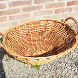 Old oval wicker linen basket, light rattan
