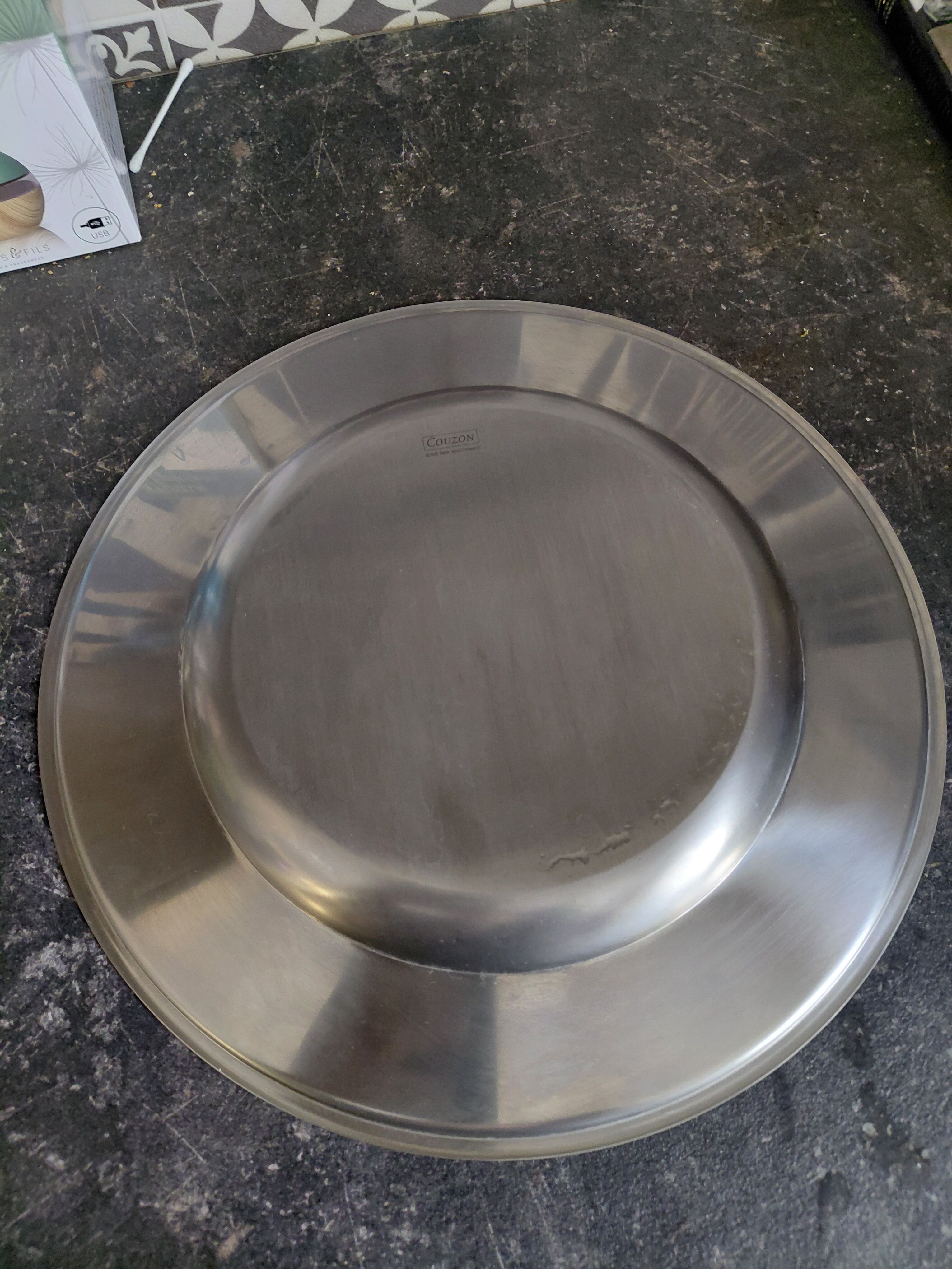 Shallow round plate Jean Couzon