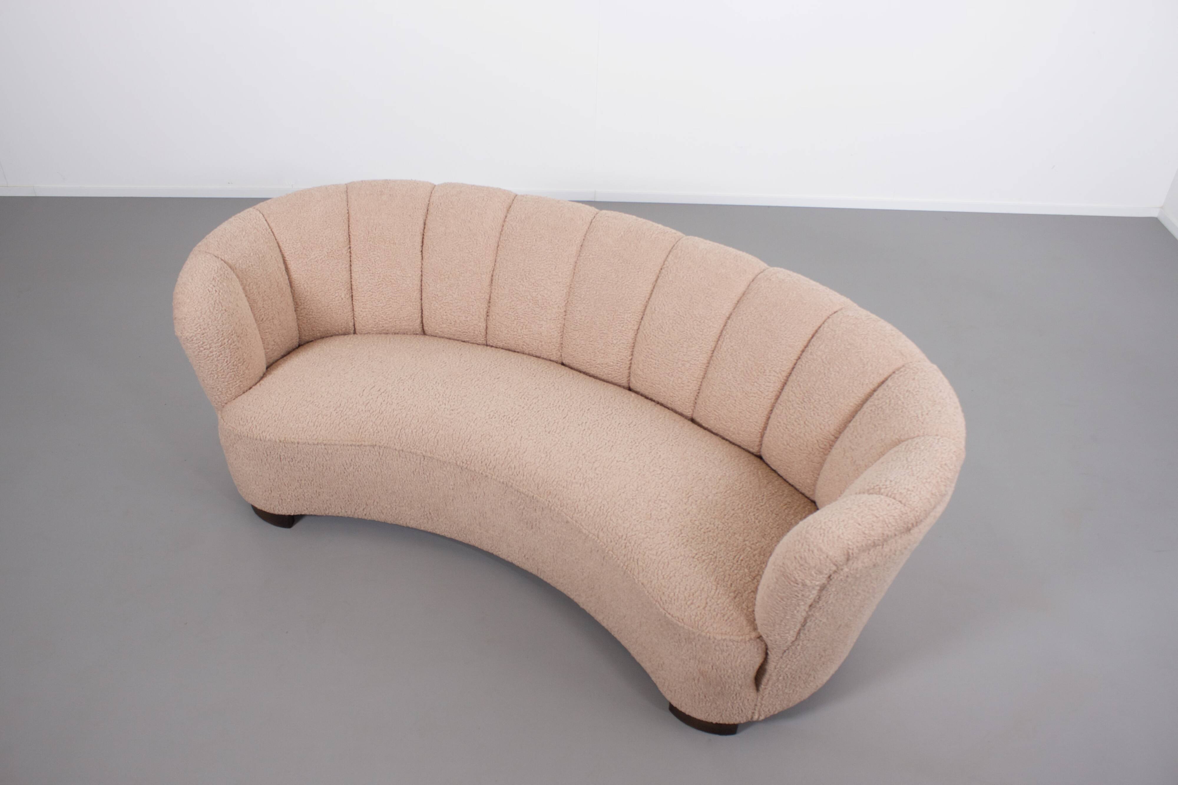 Danish curved banana sofa in a powder pink wool fabric, 1940s