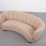 Danish curved banana sofa in a powder pink wool fabric, 1940s