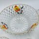 Vintage glass fruit salad serving set with a pansy design.