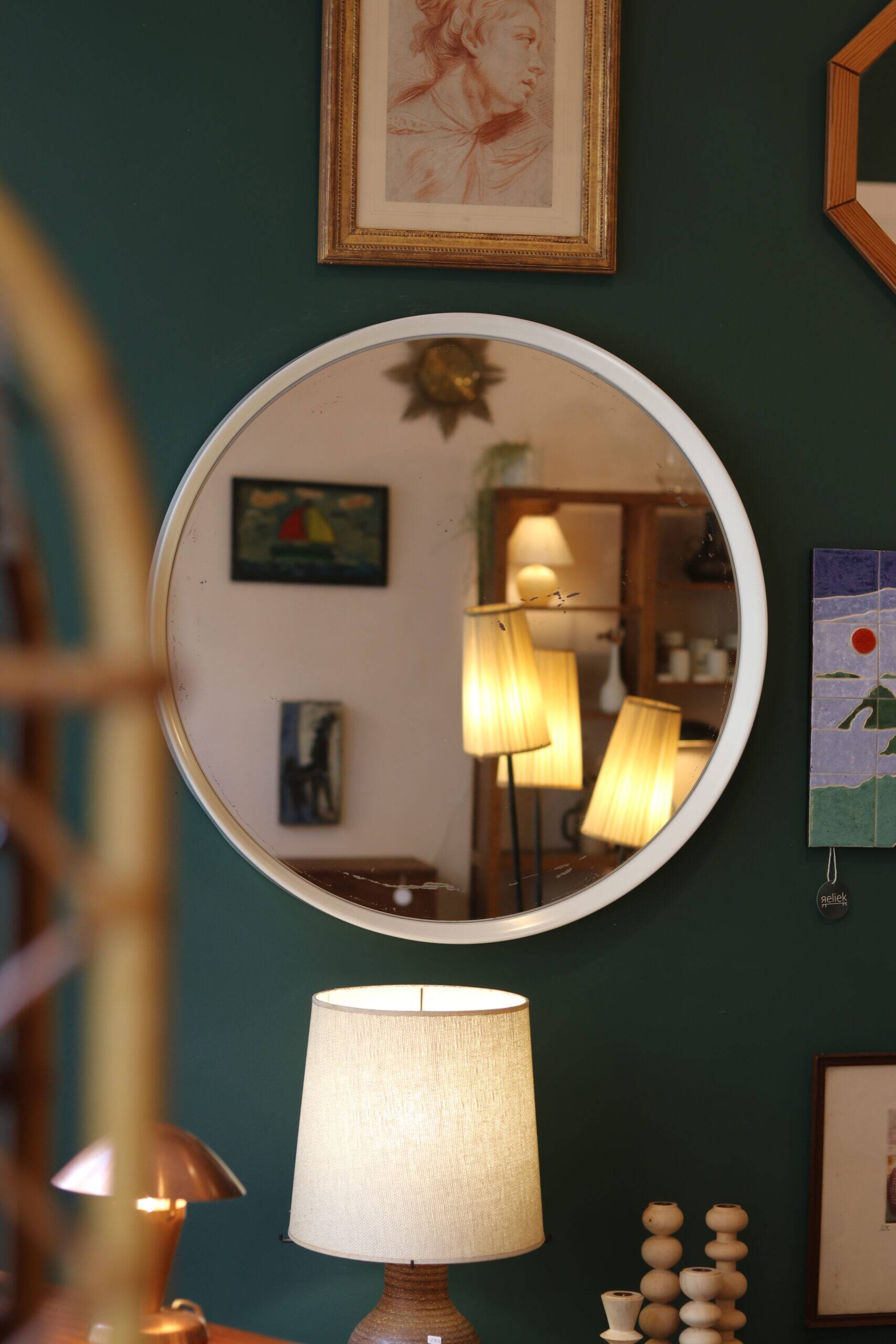 Large vintage circular mirror, plastic frame.