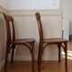 Pair of patinated bistro chairs