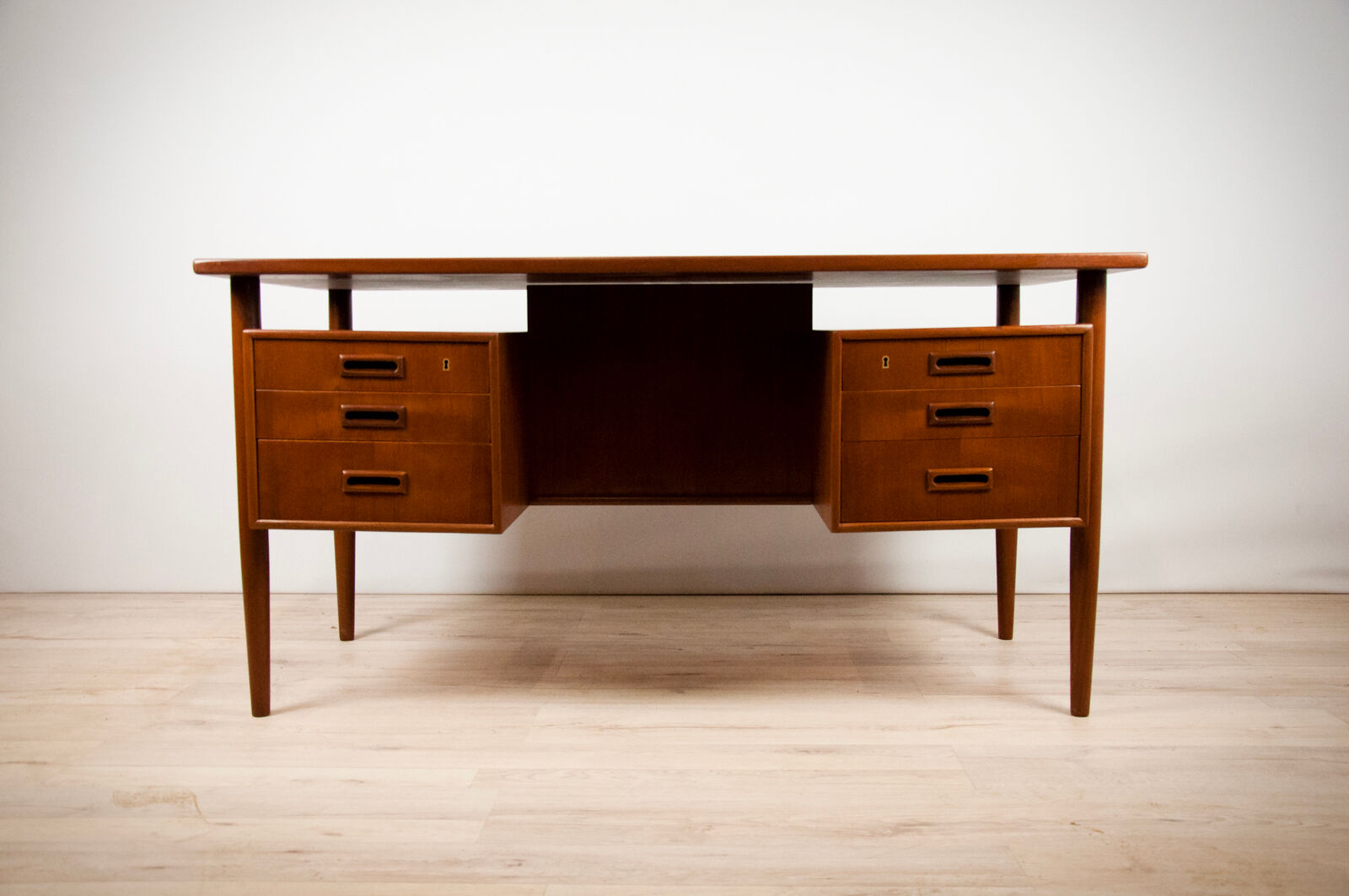 Teak desk by A. Vodder
