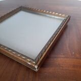 Old square golden frame to place or hang