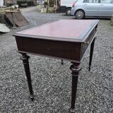 Bureau plat en acajou du XXe