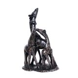 African stone sculpture of 3 Giraffes