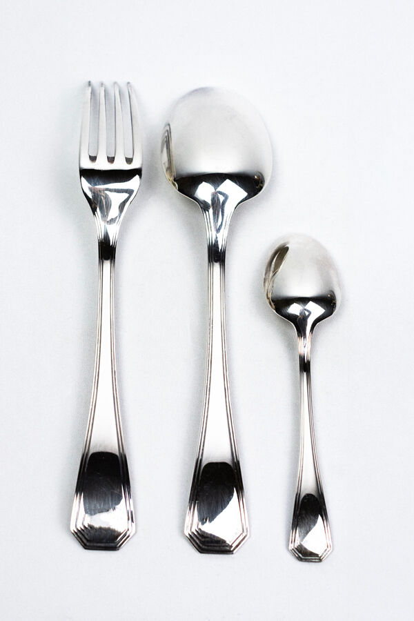 Three-piece birth set "America" — Christofle. 20th century.