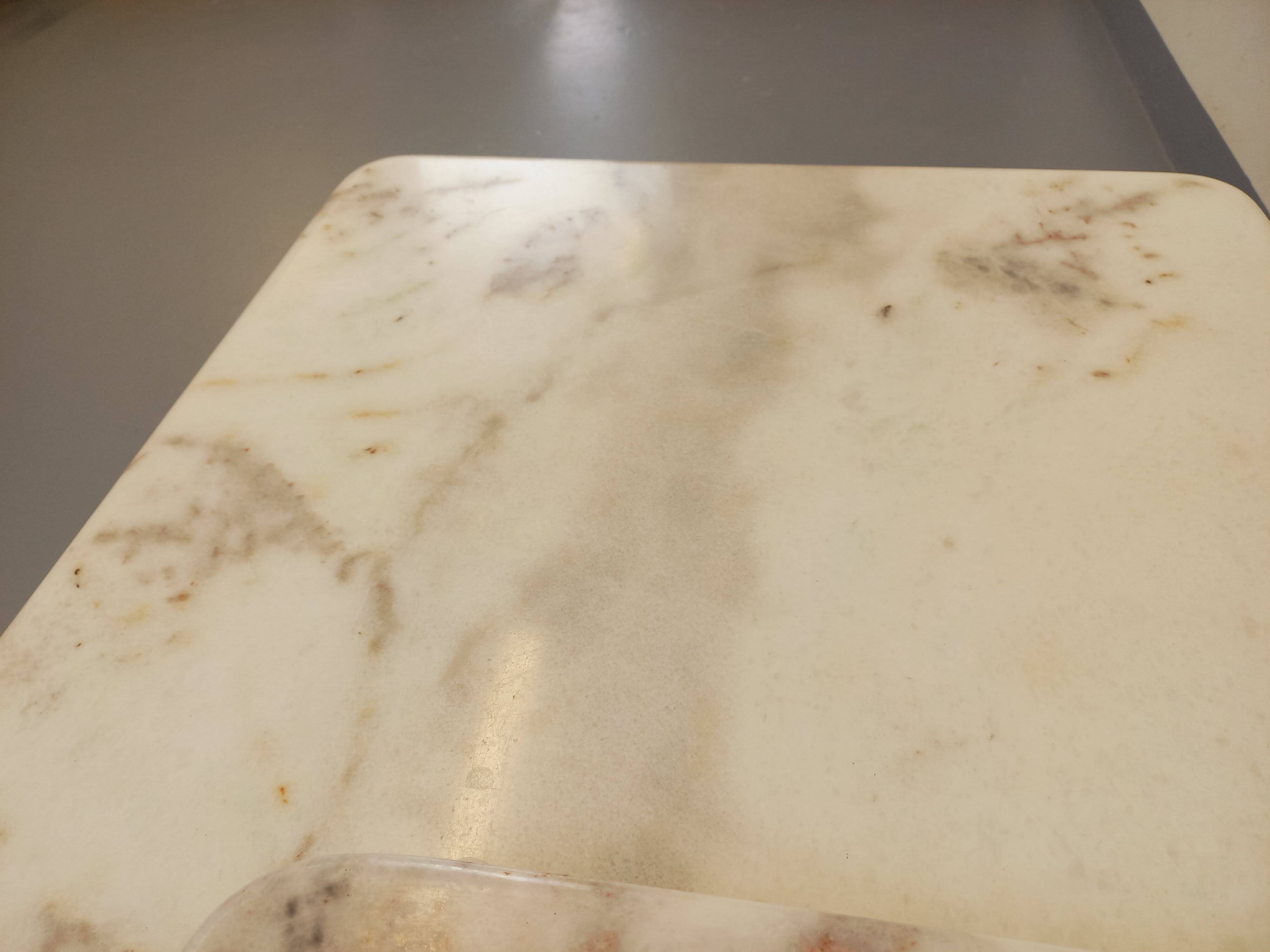 Pair of vintage nesting coffee tables in white marble from the 1970s.