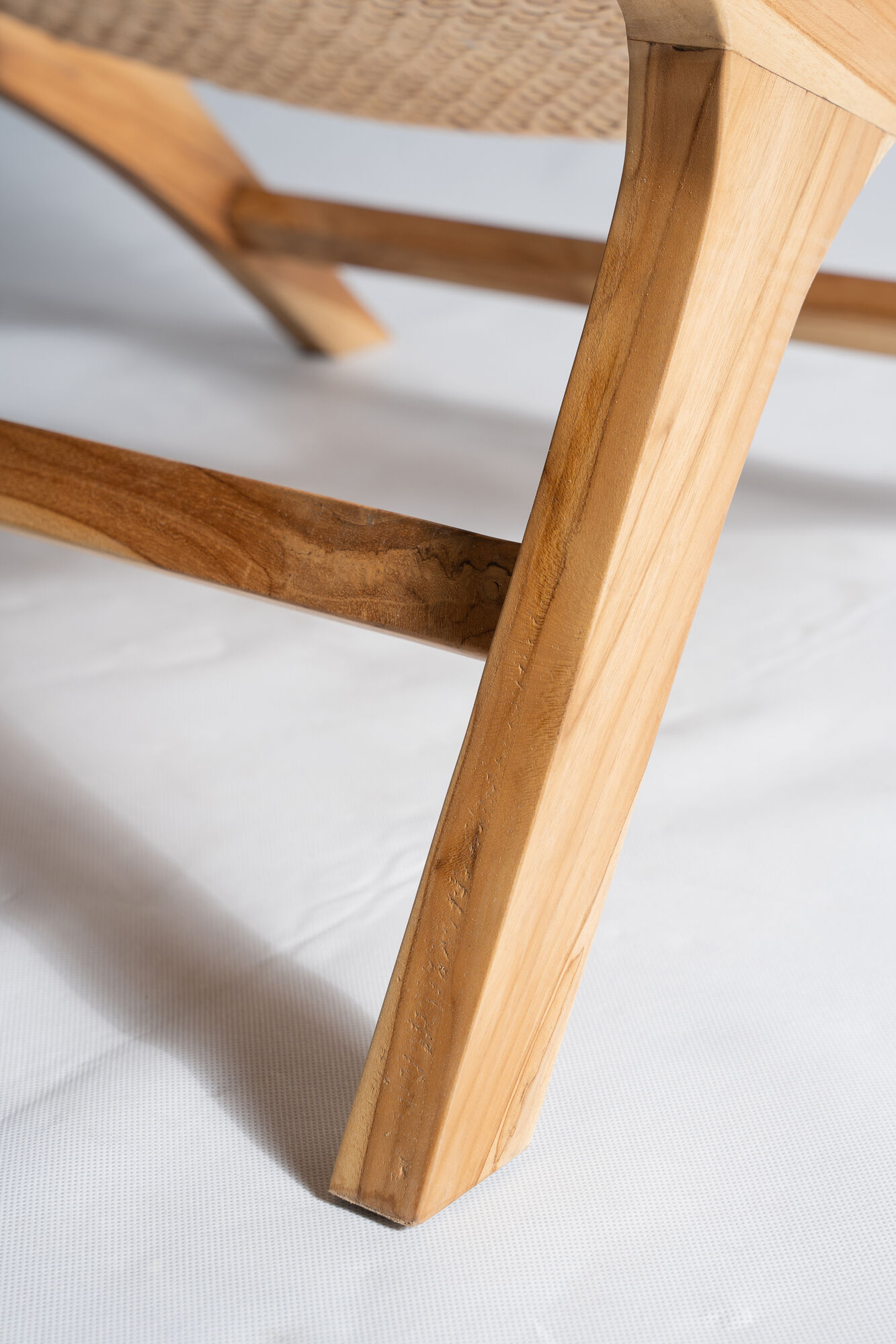 Reclining armchair in natural wood and woven rattan
