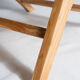 Reclining armchair in natural wood and woven rattan