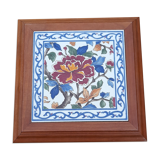 Underside of flat wood and faience floral pattern - retro