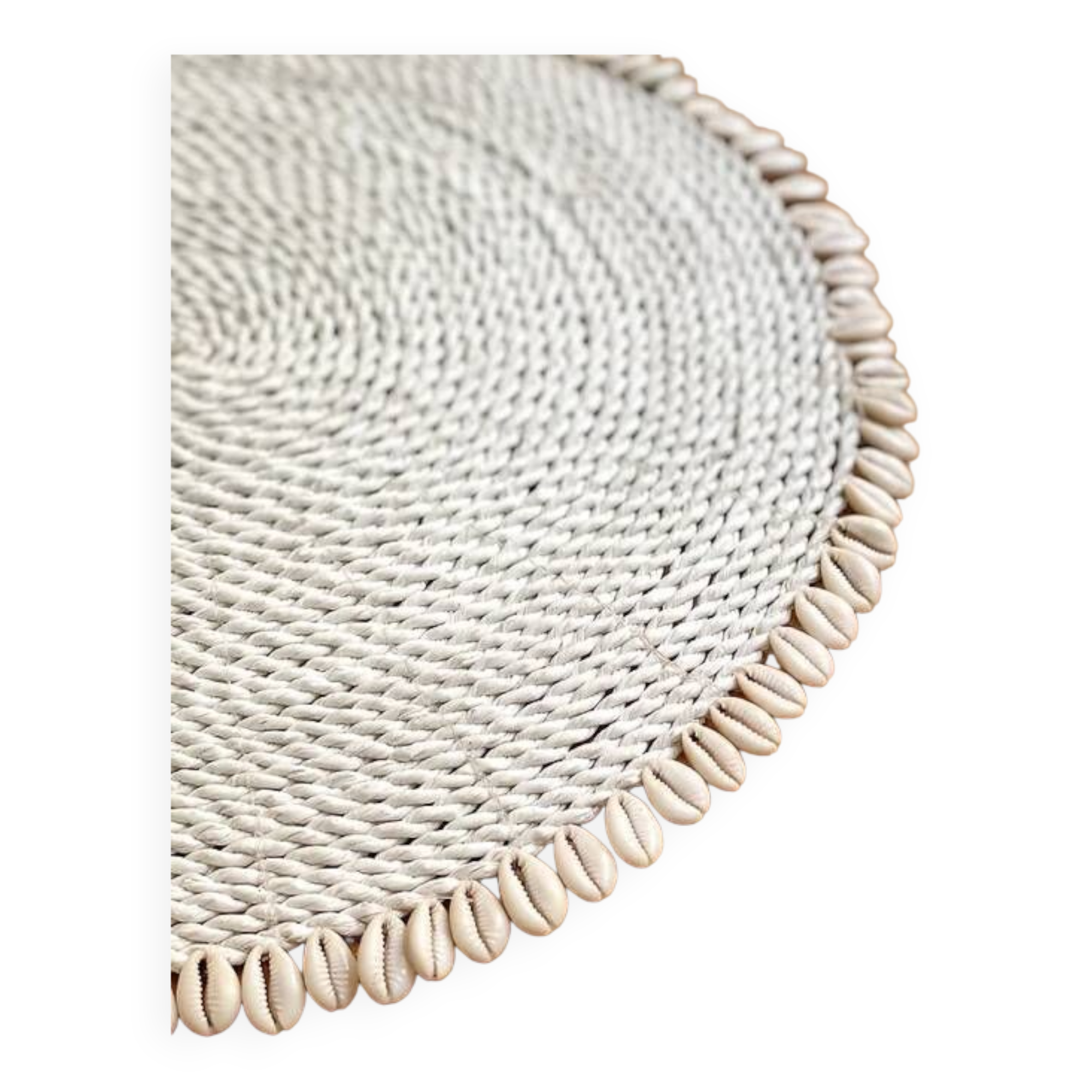 Large woven vegetable fiber placemat decorated with shells cowrie shells Bali