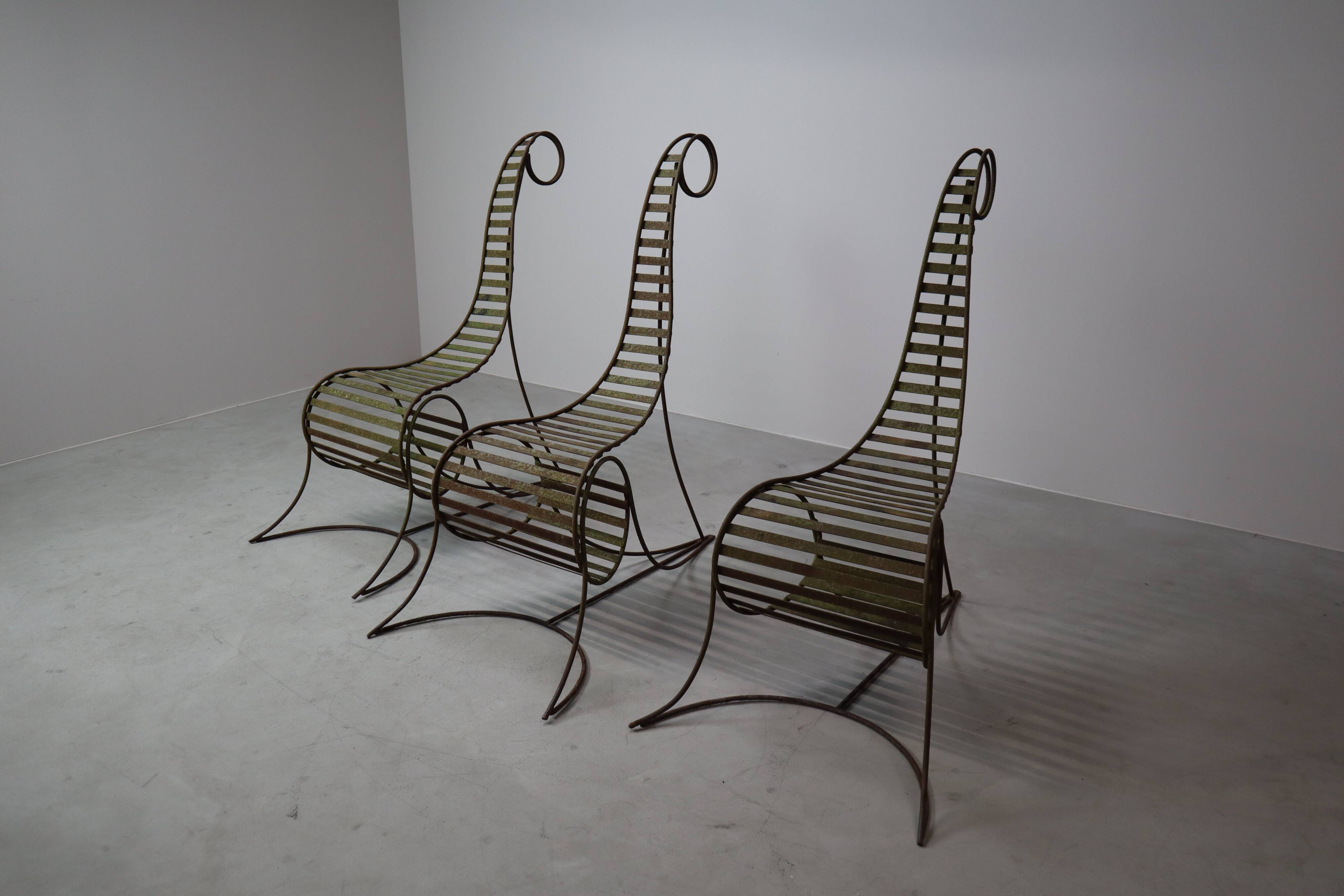Set of three sculptural iron chairs
