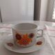 Vintage orange patterned cup and saucer