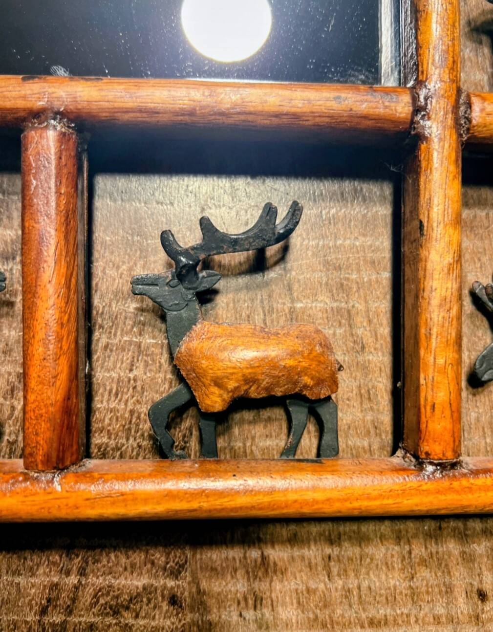 Wrought iron wood animal mirror